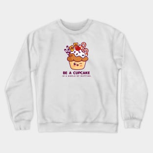 BE A CUPCAKE IN A WORLD OF MUFFINS Crewneck Sweatshirt